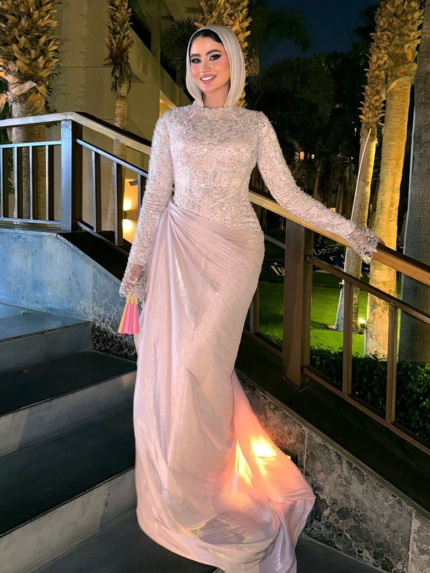 Blush pink beaded modest evening dress with draped skirt and off-white hijab in night garden